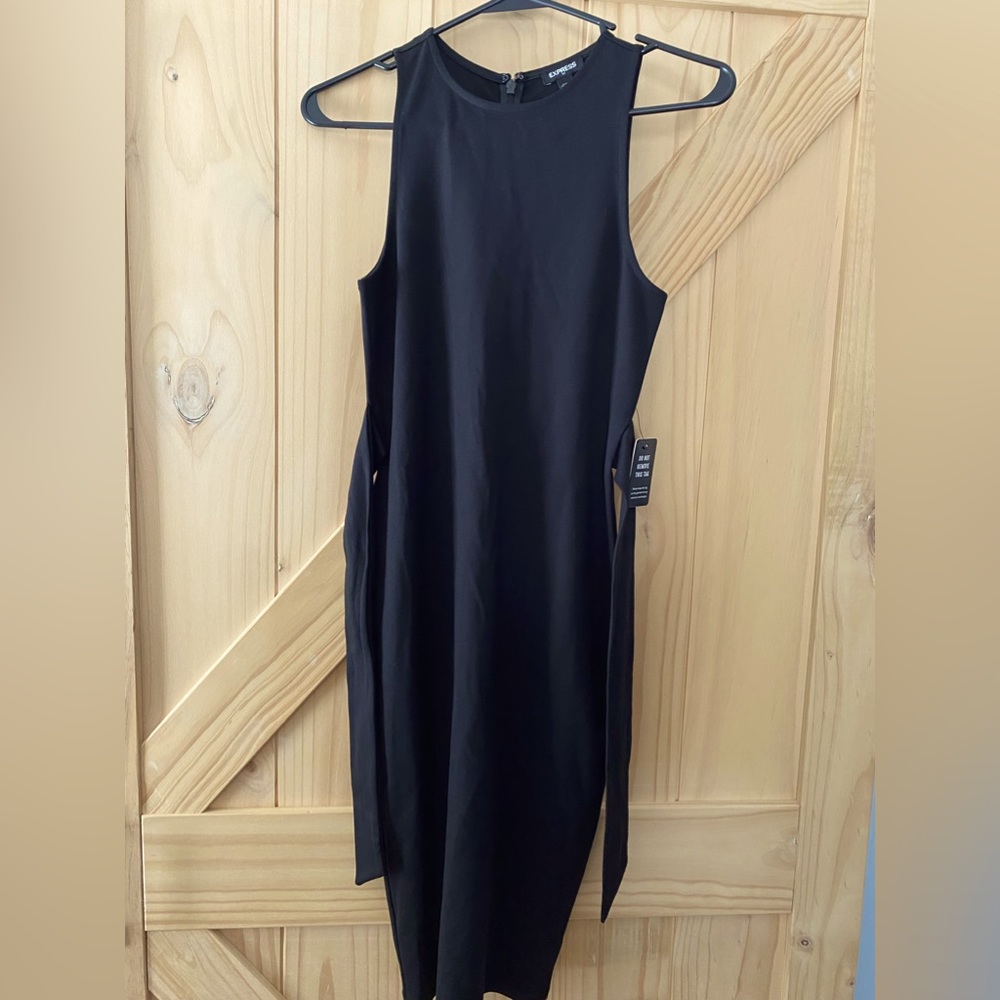 NWT Express xxs curvy black dress. Nice curves in right spots. 2 side sashes